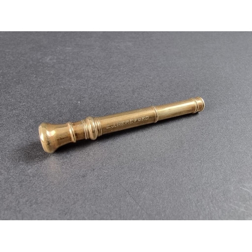 341 - A vintage yellow metal gold cigar piercer, stamped '9ct', 7cm long.