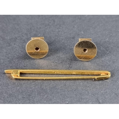 342 - A pair of yellow metal dress studs and bar brooch, stamped '9ct', 3.3g.