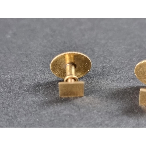 342 - A pair of yellow metal dress studs and bar brooch, stamped '9ct', 3.3g.