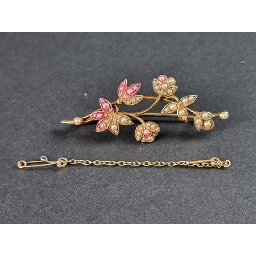 350 - A seed pearl floral spray brooch, stamped 15ct, 5.5cm long.