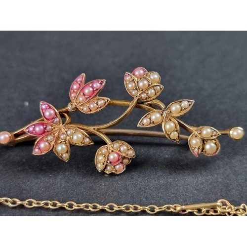 350 - A seed pearl floral spray brooch, stamped 15ct, 5.5cm long.