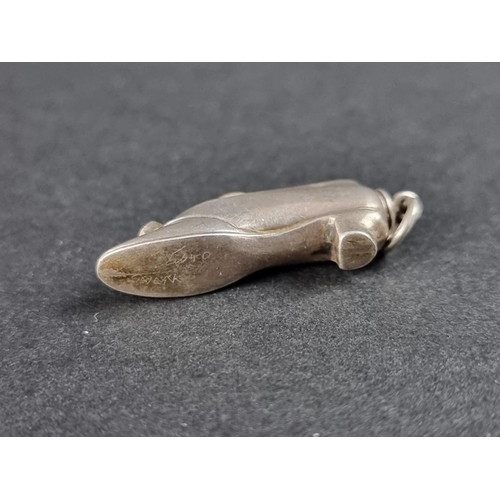 359 - A novelty white metal and brass shoe propelling pencil pendant, 31mm.