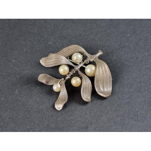 361 - A white metal mistletoe pendant brooch, set with cultured pearls, with base metal pin, 40mm high.... 