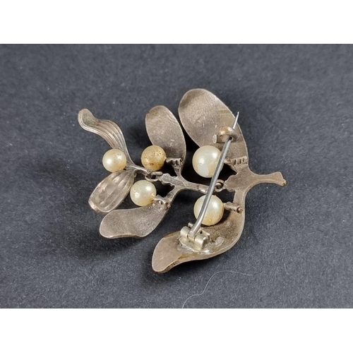 361 - A white metal mistletoe pendant brooch, set with cultured pearls, with base metal pin, 40mm high.... 