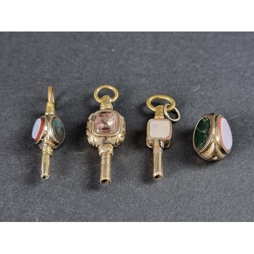 366 - Three antique gilt metal watch keys, each inset coloured stones; together with another part key. (4)... 