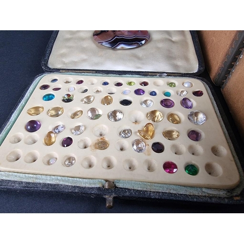 407 - A quantity of unmounted gemstones.