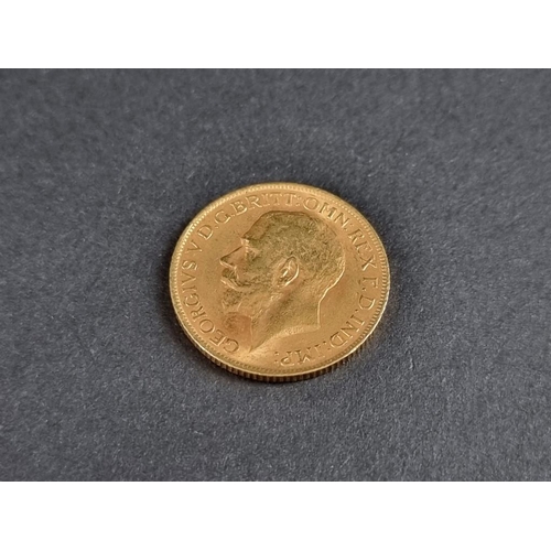 477 - Coins: a George V 1912 gold sovereign.