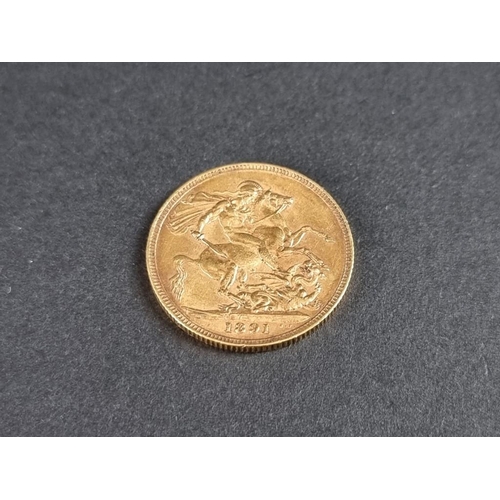 478 - Coins: a Victoria 1891 gold sovereign.