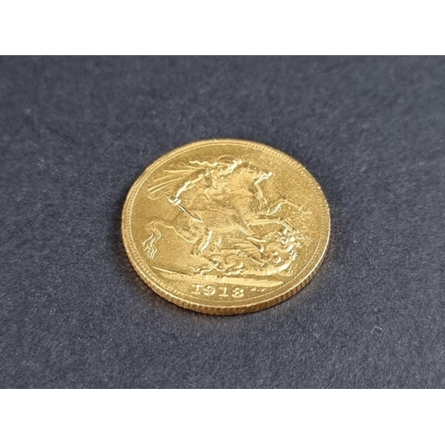 479 - Coins: a George V 1918 gold sovereign.