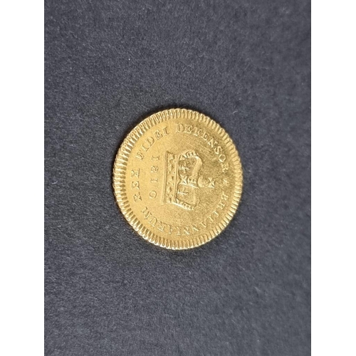 483 - Coins: a George III 1810 gold one third guinea.