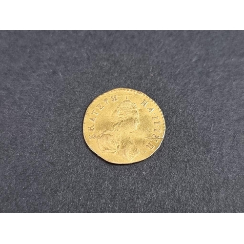 485 - Coins: a Russian Empire Catherine II gold one poltina coin, 0.65g, 12.5mm.