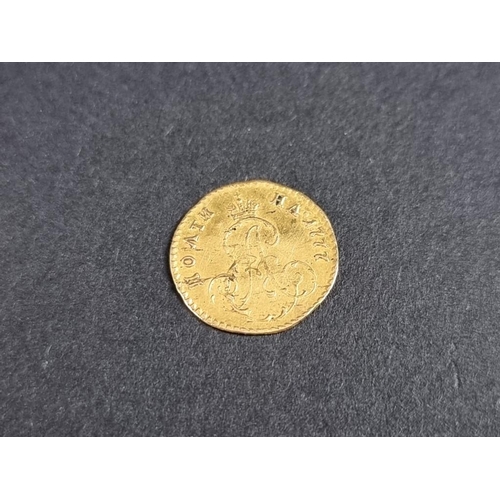 485 - Coins: a Russian Empire Catherine II gold one poltina coin, 0.65g, 12.5mm.