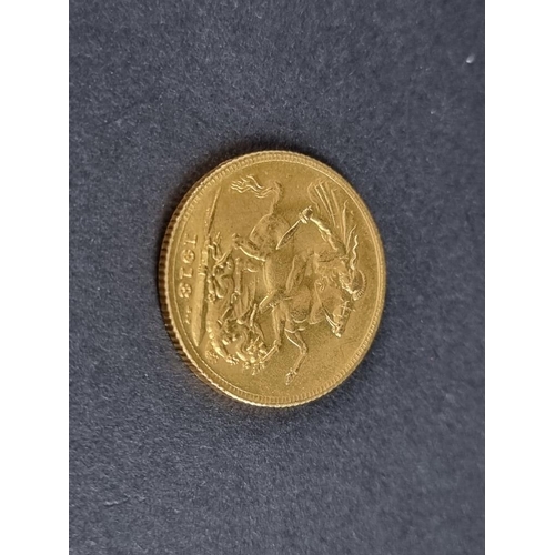 487 - Coins: a George V 1918 gold sovereign.