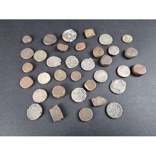 508 - Coins: an interesting group of thirty five Mughal Dynasty, Sikh Empire and Indian Princely States co... 