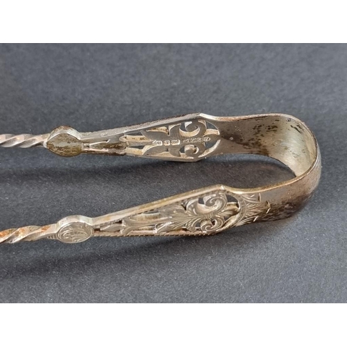 51 - A cased Victorian silver sifter spoon and matching pair of sugar tongs, Birmingham 1893, 41g.... 