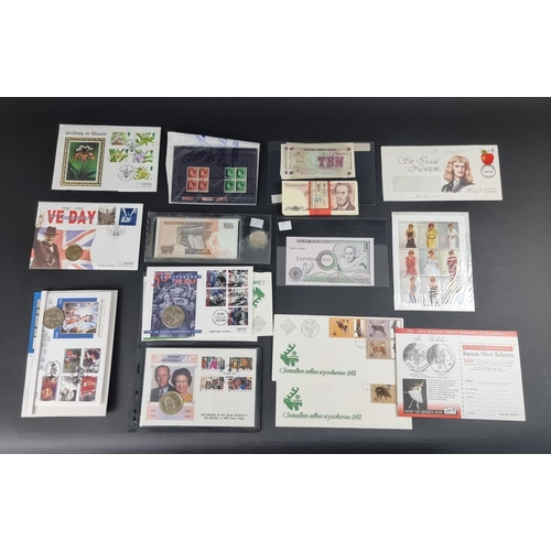 514 - Coins: a quantity of coin covers, FDCs, stamps and banknotes.