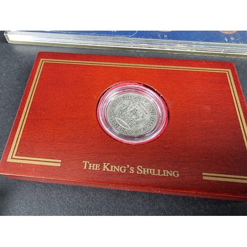 515 - Coins: a small quantity of UK coinage; together with three commemorative medals and others. (qty)... 