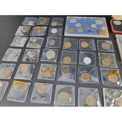 517 - Coins: a quantity of UK and world coins, mostly twentieth century, to include a few silver and part ... 