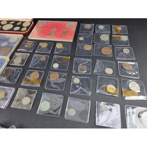 517 - Coins: a quantity of UK and world coins, mostly twentieth century, to include a few silver and part ... 