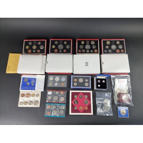 518 - Coins: five UK proof coin collections; together with six collectable fifty pence coins; and various ... 