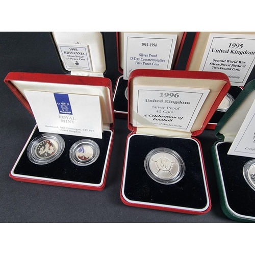 519 - Coins: eleven Royal Mint silver proof coins, 1989-96, each with CoA and box.