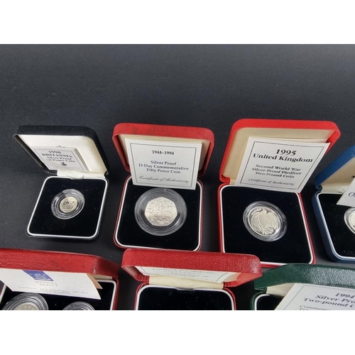 519 - Coins: eleven Royal Mint silver proof coins, 1989-96, each with CoA and box.