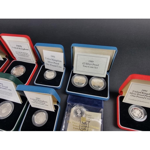 519 - Coins: eleven Royal Mint silver proof coins, 1989-96, each with CoA and box.