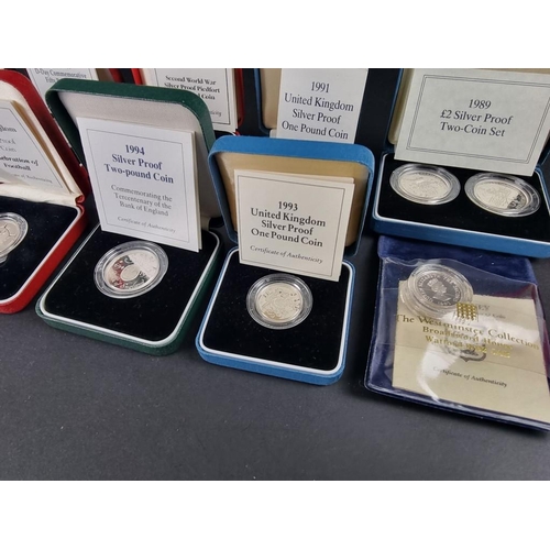 519 - Coins: eleven Royal Mint silver proof coins, 1989-96, each with CoA and box.