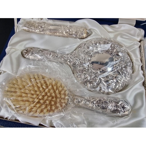 56 - A cased silver four piece dressing table set, by W I Broadway & Co, Birmingham 2000.... 