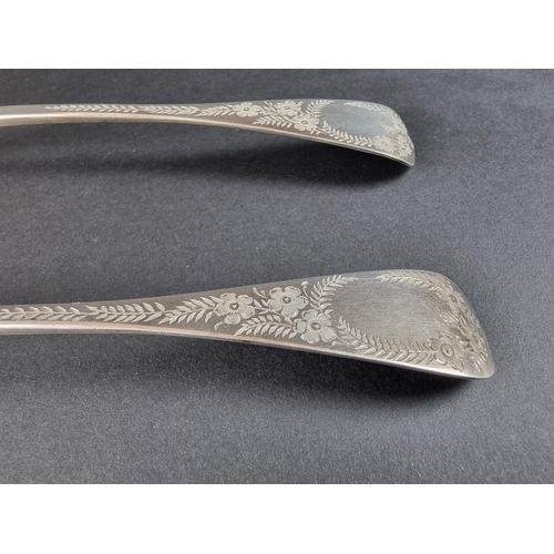 62 - A pair of William IV silver tablespoons, with later gilding and engraved decoration, by William Eato... 