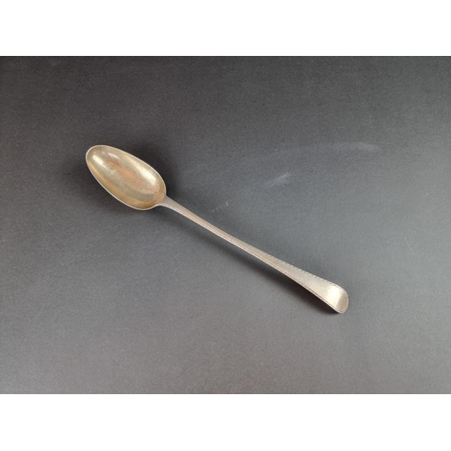 67 - A George III bright cut spoon, by George Smith III, London 1776, 28.5cm long, 105g.