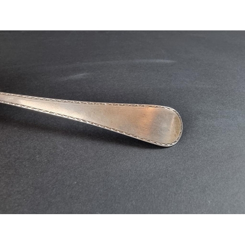 67 - A George III bright cut spoon, by George Smith III, London 1776, 28.5cm long, 105g.