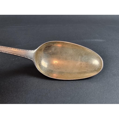 67 - A George III bright cut spoon, by George Smith III, London 1776, 28.5cm long, 105g.