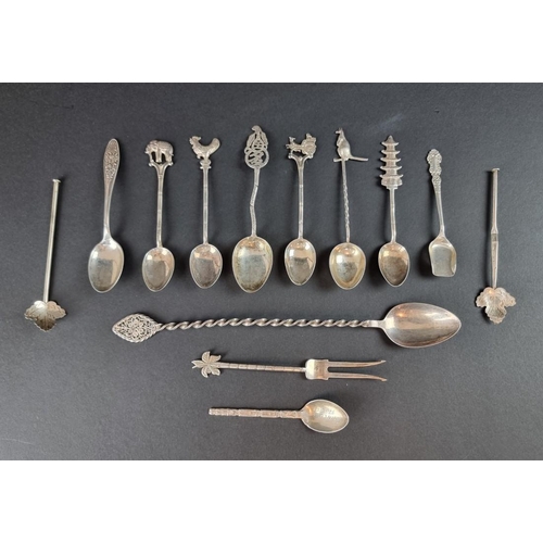 69 - A group of white metal cutlery, to include Chinese examples. (13)