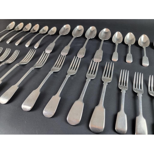 76 - A quantity of Georgian and later silver cutlery, mostly fiddle pattern, 1536g.