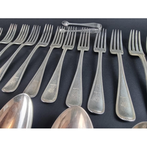 79 - A part canteen of Victorian silver bead pattern cutlery, by Chawner & Co, London, 1868-72, 3576g... 