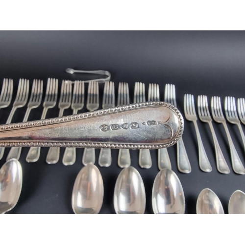 79 - A part canteen of Victorian silver bead pattern cutlery, by Chawner & Co, London, 1868-72, 3576g... 