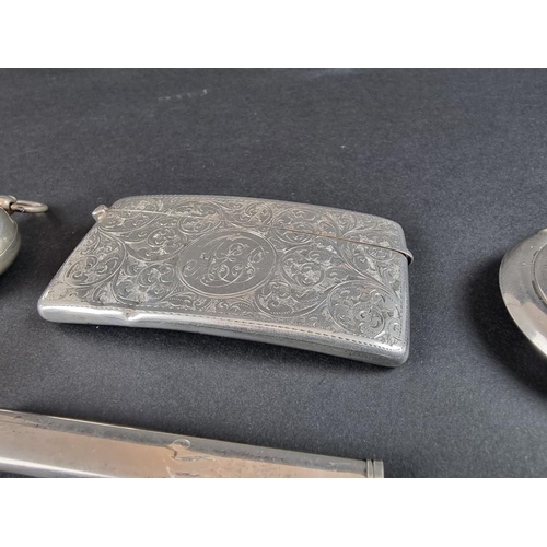 92 - A group of silver items, to include a card case, by William Neale, Birmingham 1905; and a stamp case... 