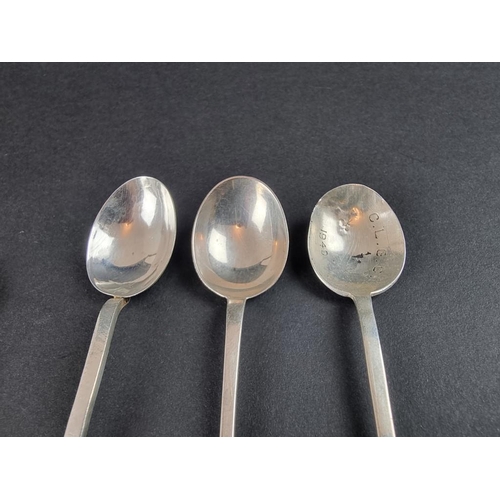 95 - Six various silver seal top coffee spoons; together with an EPNS purse. (7)