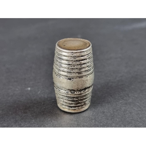 96B - A Georgian barrel-shaped nutmeg grater, marks rubbed, 3.5cm high, gross weight 11.5g.... 