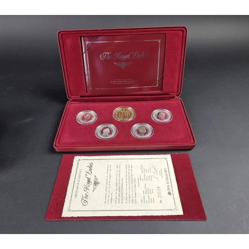 522 - Coins: a Royal Australian Mint silver coin and medallion set commemorating the 40th anniversary of H... 