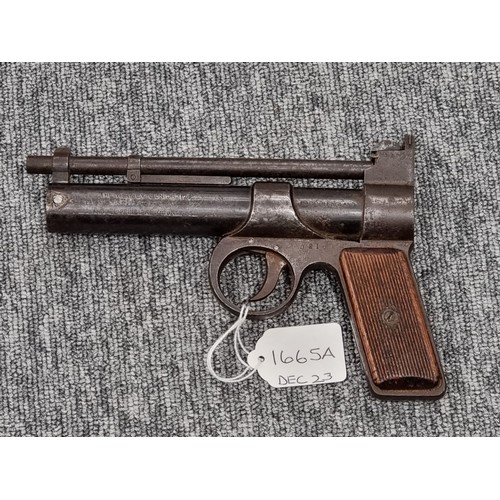 1665A - A pre WWII Webley Junior MK1 Cal .177 air pistol, having wooden grips and adjustable rear sight, Ser... 