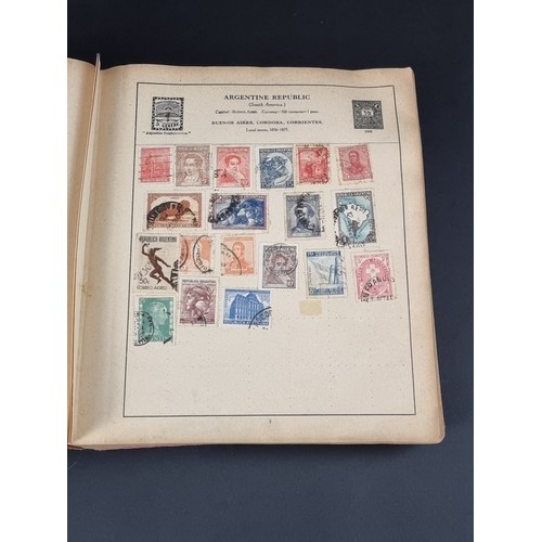 1506A - A strand stamp album containing a collection of mixed commonwealth and all world stamps, Victoria to... 