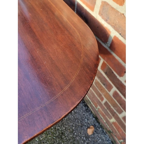 1108 - A 19th century mahogany and line inlaid tilt-top breakfast table, 143cm wide.