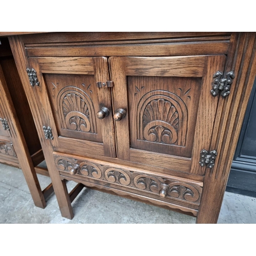 1004 - A pair of 'Bevan Funnell' oak side cabinets, 68.5cm wide. (2)