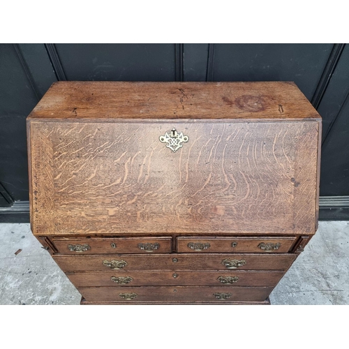 1013 - An 18th century oak bureau, 91.5cm wide.