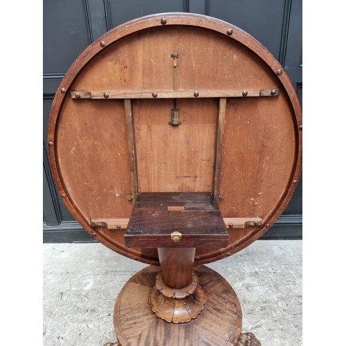 1037 - An early Victorian mahogany circular breakfast table, 130cm diameter.