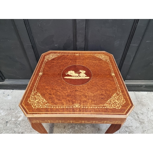 1038 - An Italian marquetry games table, incorporating a roulette wheel, backgammon and chequerboard, 74cm ... 