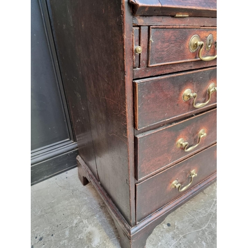 1041 - An 18th century oak bureau, 92cm wide.