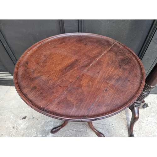 1071 - Two 19th century mahogany circular tilt top tripod tables, each with dished top, 66.5cm and 56cm dia... 